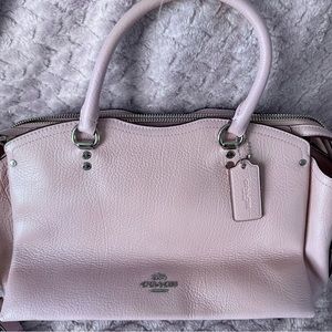 Brand new pink coach purse never been used.